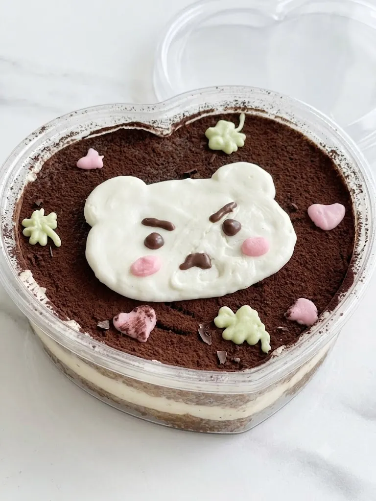 A bear-decorated heart tiramisu
